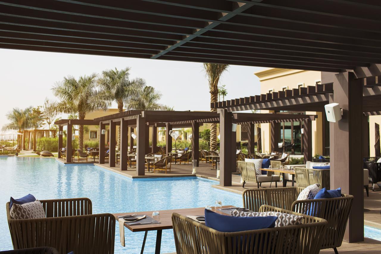 Saadiyat Rotana Resort And Villas Abu Dhabi Exterior photo The pool at the hotel